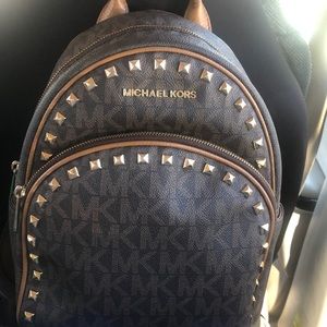A Micheal Kors backpack